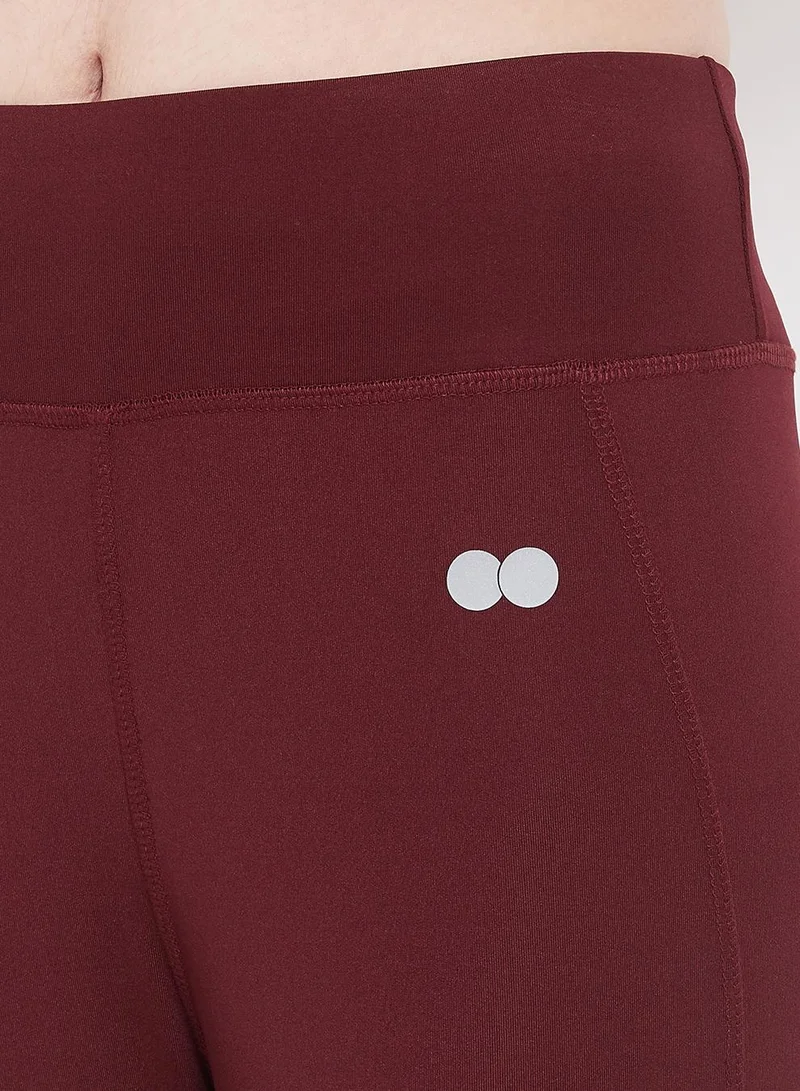 Clovia Red High Rise Activewear Tights in Maroon for Women | Best Price UAE